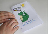 Fold with pictures out and trim if necessary.
